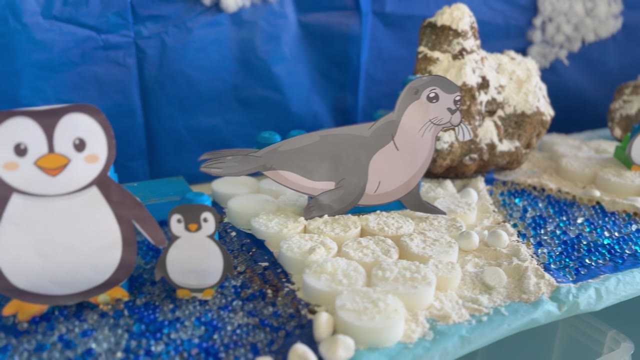 Polar-themed classroom display with penguin and seal cutouts at Little Lion Pre-School
