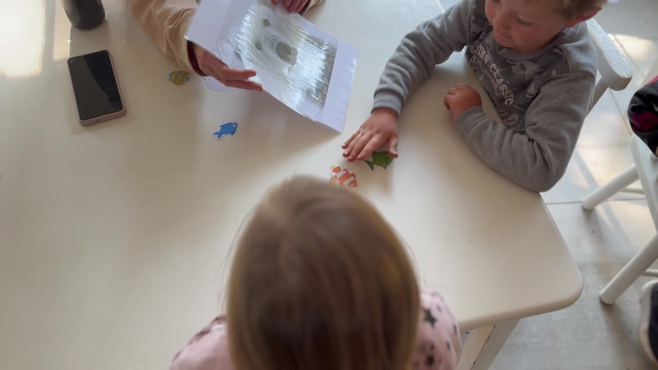 Children gathered for story time at Little Lion Pre-School