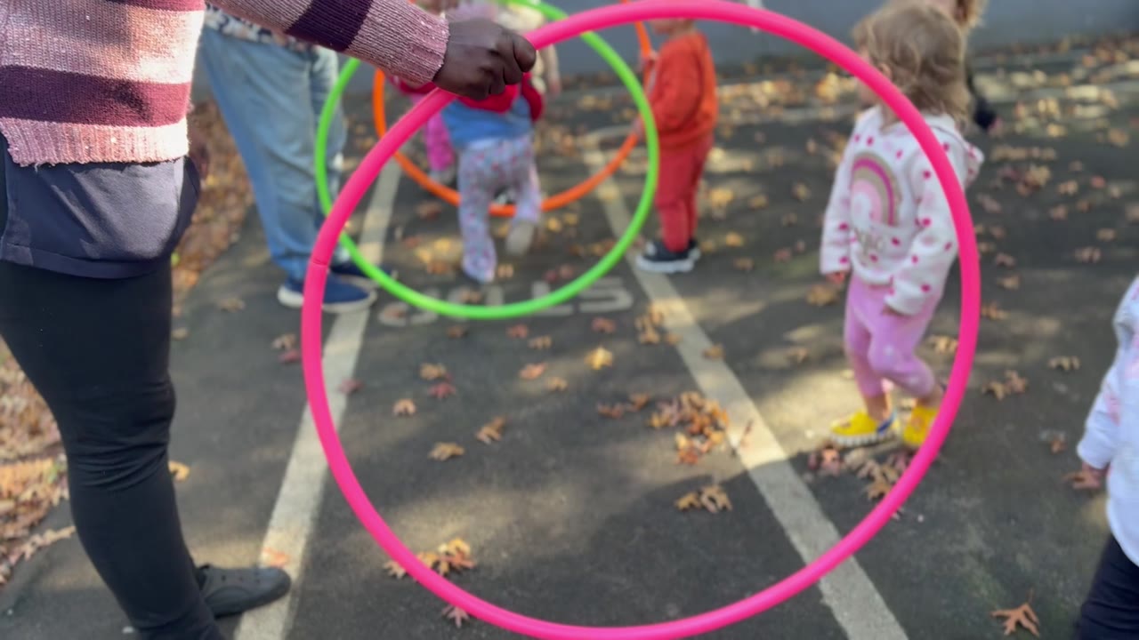 Children playing happily in the garden at Little Lion Pre-School, Rivonia